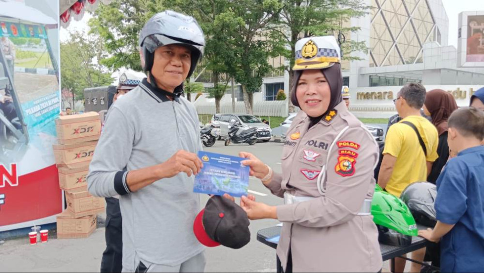Jelang Pilkada, Ditlantas Polda Riau Ajak Pengunjung CFD Tidak Golput dan Tertib Berlalu Lintas