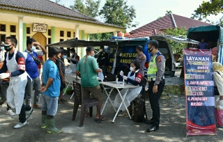 Polres Inhu Gelar Vaksinasi di Pasar Kota Rengat