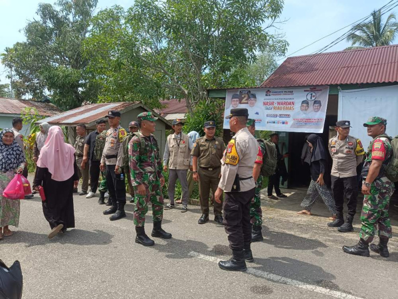 Polsek Tempuling Bahu Membahu Bersama TNI Jaga Kamtibmas Pilkada 2024