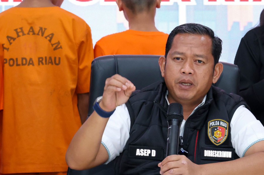 Polda Riau Tangkap Dua Tersangka Transportir PMI Ilegal dari Malaysia