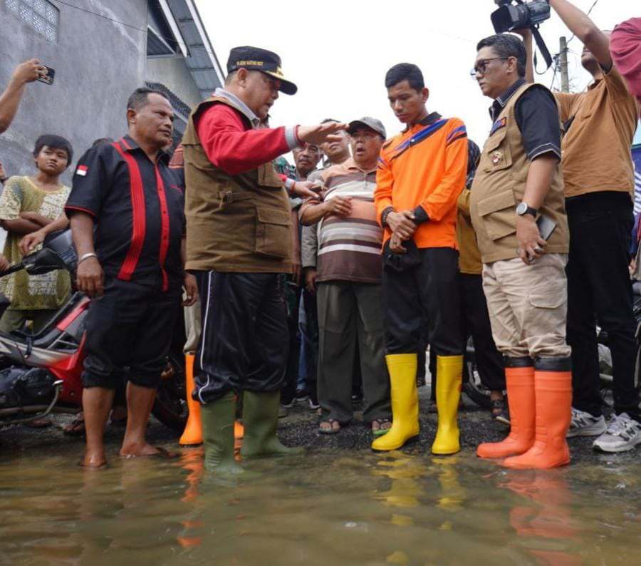 Gubri Edy Nasution Gercep Beri Bantuan Korban Banjir di Desa Kualu