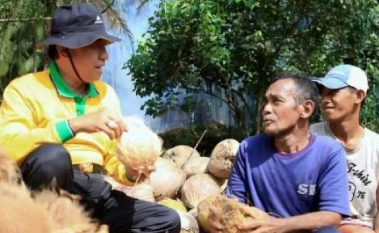 Dua Periode Bupati Wardan Konsisten Kembangkan Sektor Perkebunan Kelapa, Buka Arus Investasi dan Tekan Inflasi
