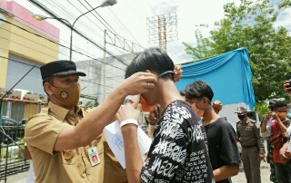 Pjs Kabupaten Siak Lakukan Sosialisasi Penindakan Pelanggaran Protokol Kesehatan