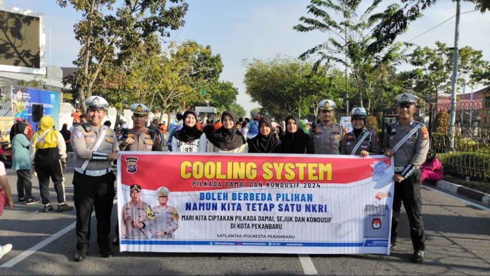 Satlantas Polresta Pekanbaru Gelar Kampanye Keselamatan dan Pilkada Damai di Area CFD