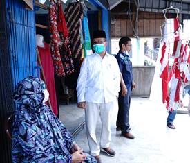 Lansia Disiplin Pakai Masker, Sekda Siak: Ini Jadi Teladan