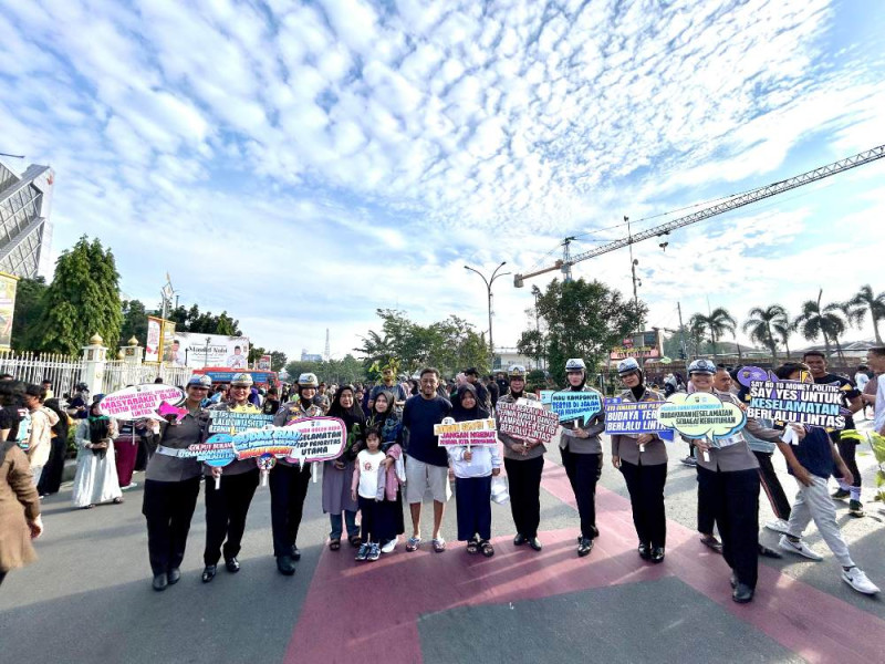 Ditlantas Polda Riau Ajak Pengunjung CFD di Pekanbaru Sukseskan Pilkada 2024