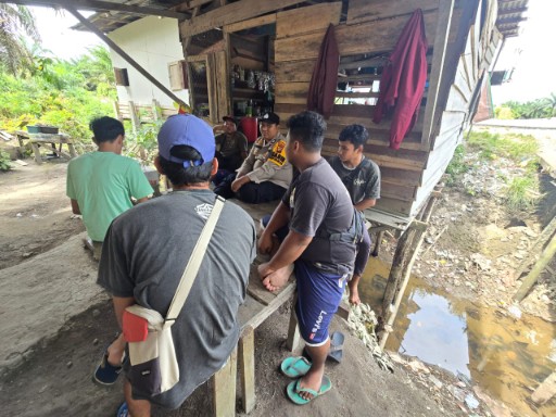 Bhabinkamtibmas Polsek Bonai Darussalam Laksanakan Giat Colling System Pasca Pilkada 2024