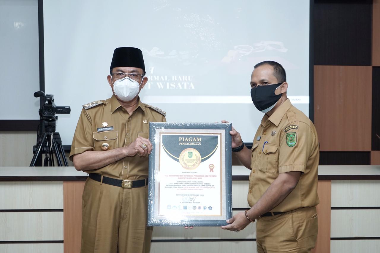Diterima Bupati Wardan, Sejumlah OPD di Inhil Terima Penghargaan dari Mendagri