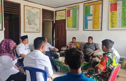 Polsek Bonai Darussalam Ajak Masyarakat Desa Rawa Makmur Sukseskan Pilkada 2024