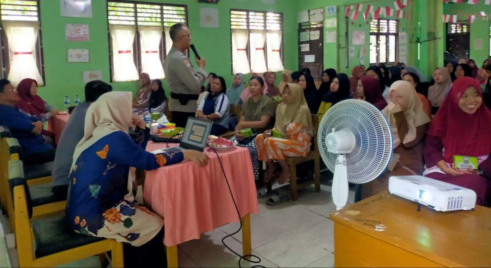 Polsek Kandis Gelar Cooling System, Ajak Warga Kampung Belutu Ikut Pilkada Damai