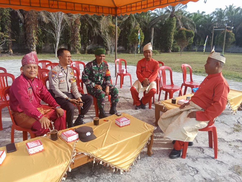 Polsek Tambusai Utara Sampaikan Pesan Pilkada Damai di Desa Mahato Sakti
