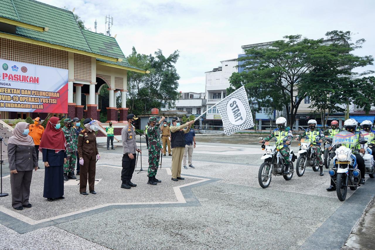 Bupati Inhil Pimpin Apel Penyemprotan Massal dan Peluncuran Satgas Pemburu Teking Covid-19